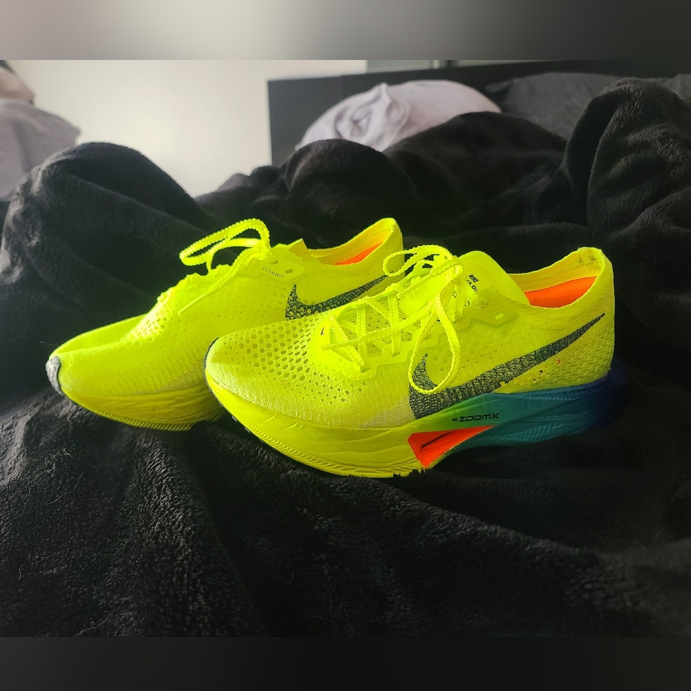 Nike Yellow and Blue Athletic Shoes with Iconic Swoosh